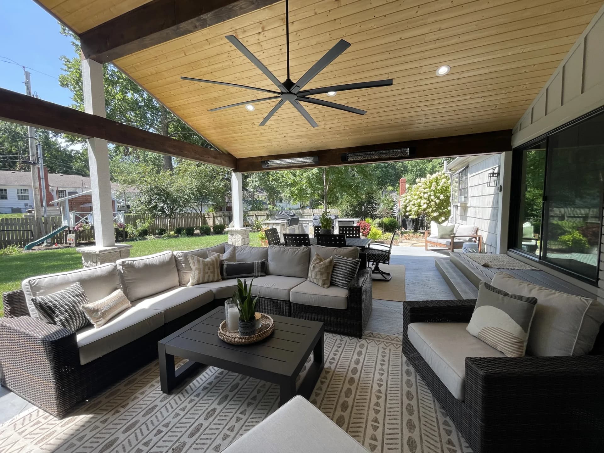 Overland Park home addition with outdoor living by Above Par Contracting